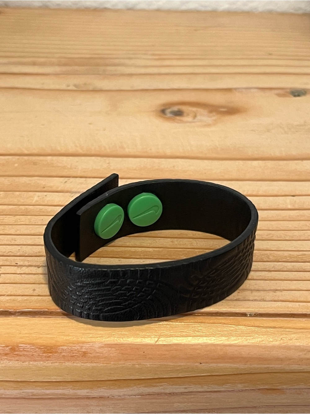 Nike black band bracelet with snap buttons